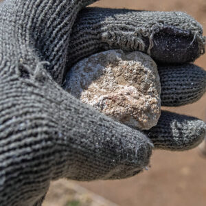 A chunk of mortar found in the clay cap of the well