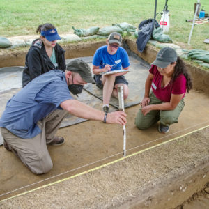 Senior Staff Archaeologist Sean Romo teaches archaeological techniques to members of the Field School.