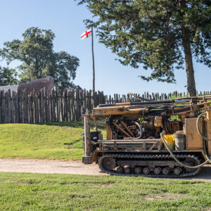 The boring machine heads to its next work site. The north bulwark of James Fort is just to its left.