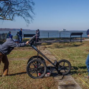 Staff Archaeologists Caitlin Delmas and Natalie Reid conducting a ground-penetrating radar survey of the Statehouse area.
