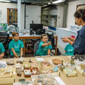 Assistant Curator Emma Derry and campers discuss some of the animal remains found at Jamestown and what they can tell us about the people who lived there.