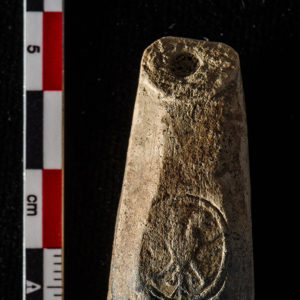 A ceramic pipe bowl with a double-headed eagle on both sides. This was found in the north Church Tower excavations.