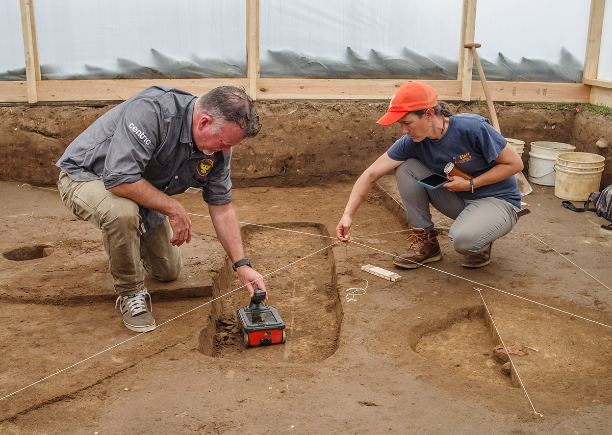 Director of Archaeology David Givens conducts a high frequency GPR survey of one of the burials and is assisted by Senior Staff Archaeologist Mary Anna Hartley.