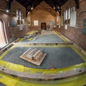 Church interior with in-progress floor renovation