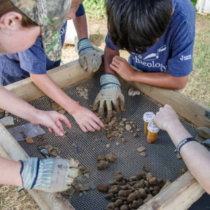 Campers sort artifacts found while screening the Confederate moat fill.