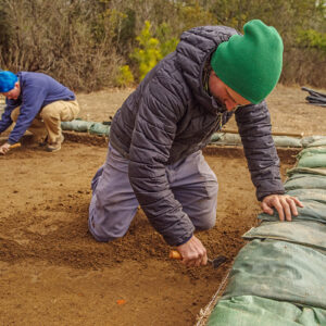 Staff Archaeologists Caitlin Delmas and Gabriel Brown at the Godspeed Cottage excavations