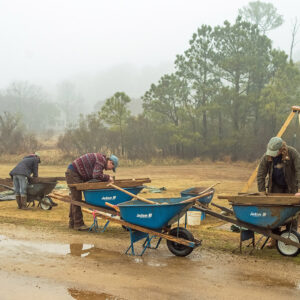 Despite the crummy weather the team continued their excavations in order to complete them before pathway construction begins.
