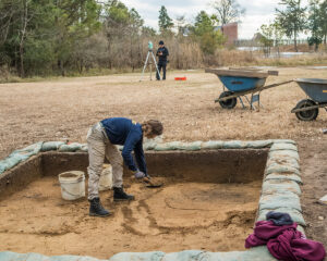 Archaeological Field Technician Ren Willis (foreground) and Staff Archaeologist Gabriel Brown at the excavations outside the Godspeed Cottage