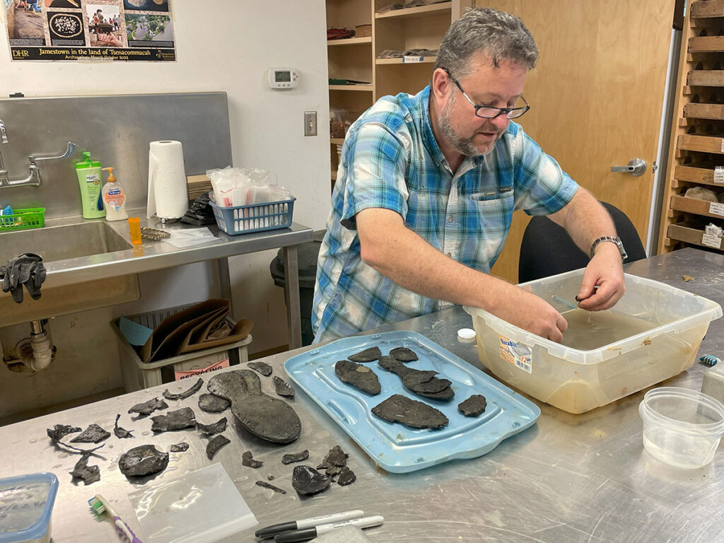 Other leather shoe fragments including pieces of heels, and strips with stitching holes could belong to one of these three shoes, but it is impossible to know with certainty.