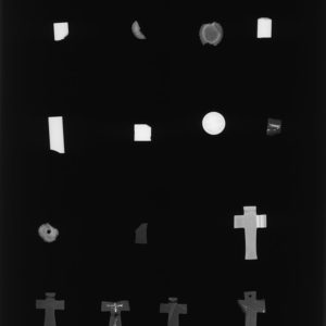 An X-ray of some of the jet-like artifacts in the Jamestown Rediscovery collection. The four crucifixes in the bottom row are confirmed to be jet but the one in the row above it is made of a substance denser than jet.