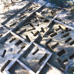aerial view of many excavated burial shafts