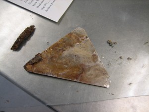 Triangular glass fragment