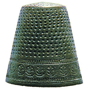 Copper alloy thimble with stamped floral decoration around base