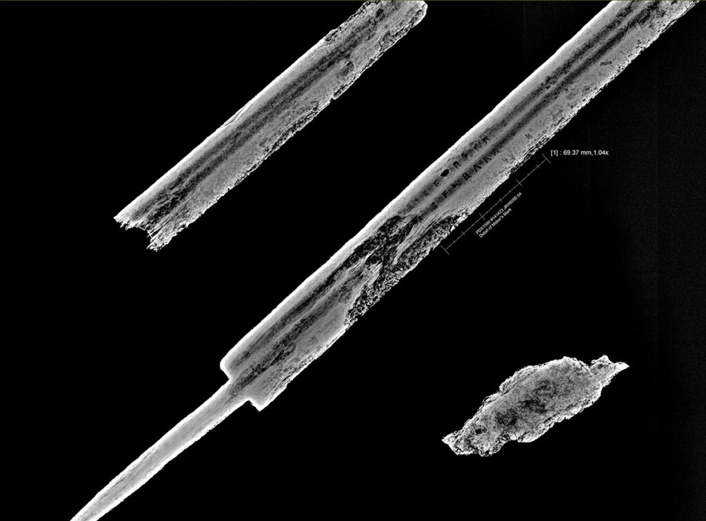 An edited x-ray image showing sword fragments after initial conservation treatments.