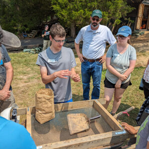 Field School student Drew Parker talks about some of the artifacts found at the clay borrow pit excavations.