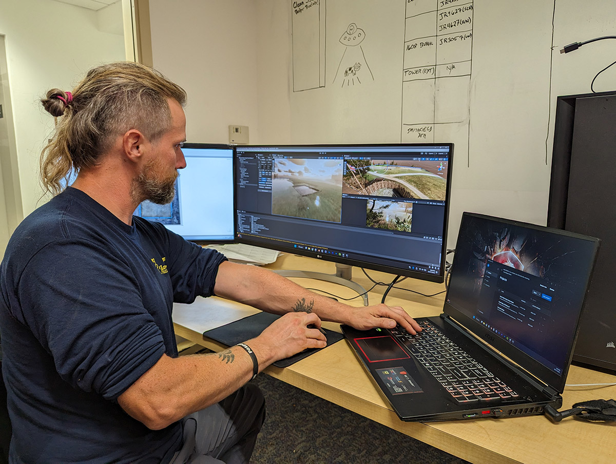 Archaeological Field Technician Gabriel Brown uses the Unity 3D engine to place georectified photos of archaeological excavations on a virtual landscape.