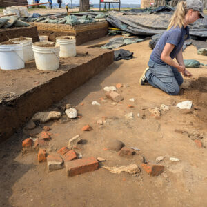 The architectural materials in the clay cap at the top of the well