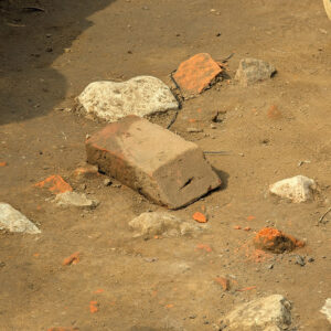 A water table brick found in the clay cap of the well