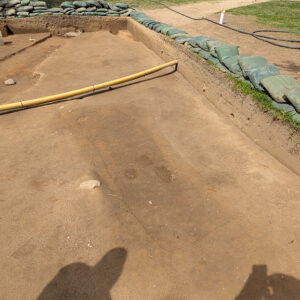 A burial, scored by an archaeologist to make it easier to see, discovered in the North Church excavations