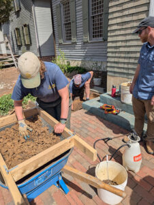 Archaeological Field Technicians Eleanor Robb and Josh Barber excavate the areas that will be affected by the stairs improvements at the Yeardley House.
