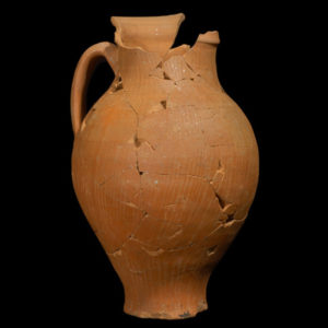 Mended earthenware jug