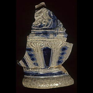 Broken blue and white stoneware vessel