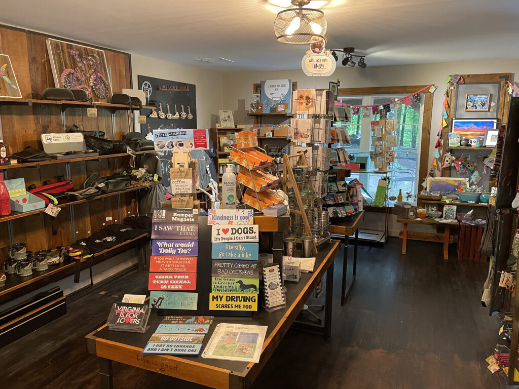 Fun gifts, gear, and souvenirs offered in the shop at Spoke & Art