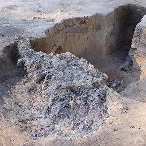 Excavated feature filled with ash