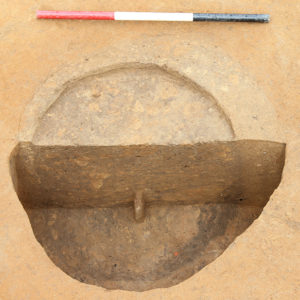 bisected excavated well feature
