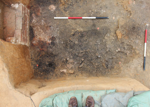 brick oven in the corner of an excavation unit