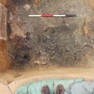 brick oven in the corner of an excavation unit