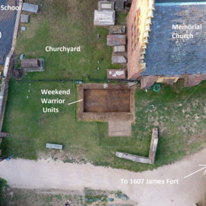 Aerial view of excavation units by brick church