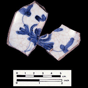 Mended Zhangzhou Porcelain sherds with blue handpainted floral decoration