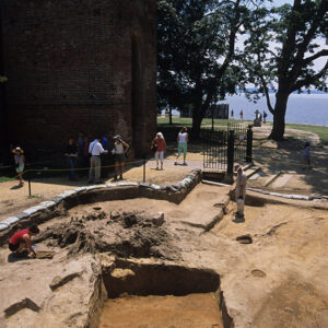 Excavations of "The Quarter" in 1994 just outside the Church Tower. The concrete steps seen in front of the Tower have been uncovered in this month's dig.