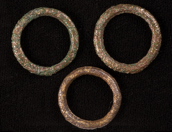 Three copper alloy curtain rings