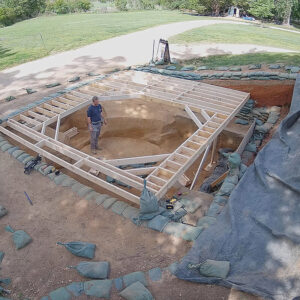 Archaeologist Gabriel Brown builds the well observation platform.
