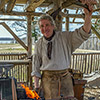 A blacksmith interpreter and a forge