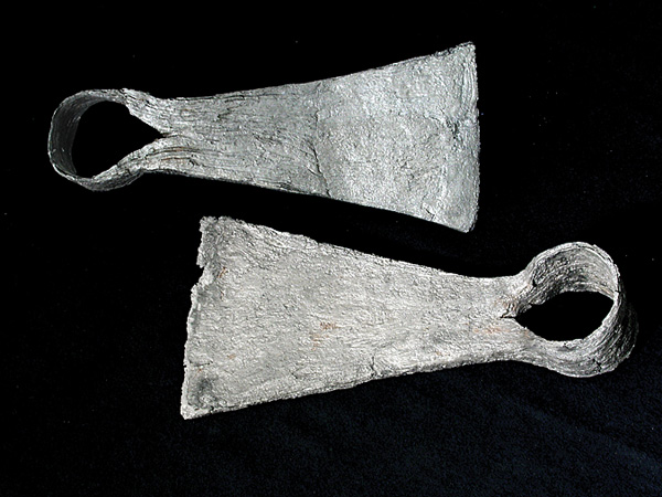 Two views of an iron agricultural hoe