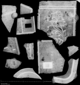 X-rays of the 19th-century gas stove reveal text and decorative elements.
